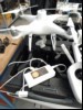 SDI DJI P4 RTK Drohne (Model:WM334R, Fernbedienung mit Smartphone-Befestigungsclip, 2x Akkus (ein Akku hat am Plastik Rahmen einen Bruch), Ladestation mit Netzteil, mit Transportbox, Drohne lässt sich Einschalten, LED\'s leuchten Rot und Gelb, Fern...